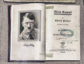 Hitler writes Mein Kampf