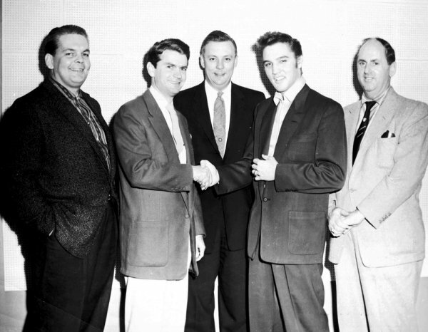 Elvis Presley signs with RCA records