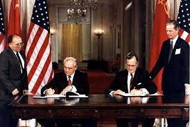 President George H.W. Bush signs treaty with Soviet Leader Mikhail Gorbachev