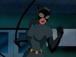 Catwoman is caught robbing a jewelry store by Batman.