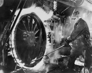 Ransom E Olds patents first Assembly Line