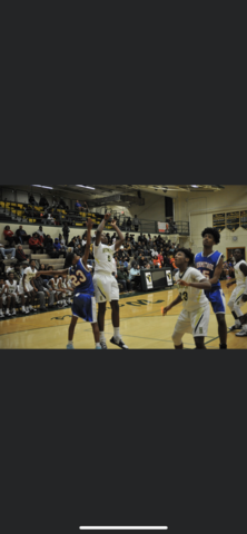 Playing my first high school basketball game