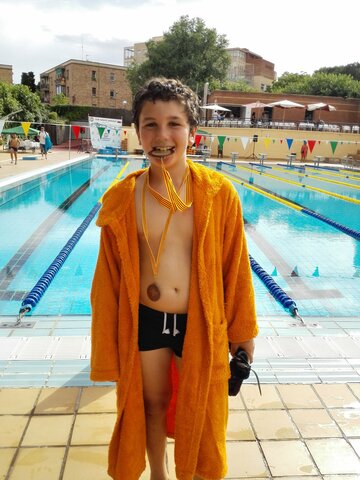 Guanyo una medalla en un concurs de natació
