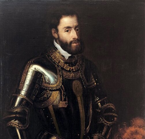 Carlos I es coronado emperador y rey de Italia en Bolonia por el Papa Clemente VII