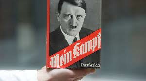 Hitler writes Mein Kampf