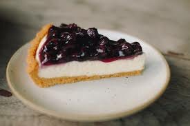 A farmer adds cream cheese to create the modern day cheesecake