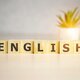 English text wooden cubes sunny background 178498728