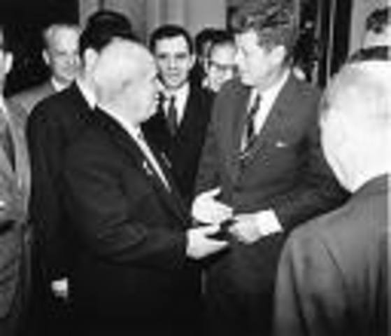 Signs treaty banning nuclear weapon testing