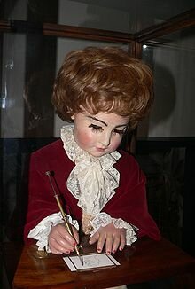 automate dessinateur et ecrivain de mailla