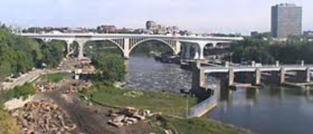 The new bridge (St. Anthony Falls) opens to traffic.