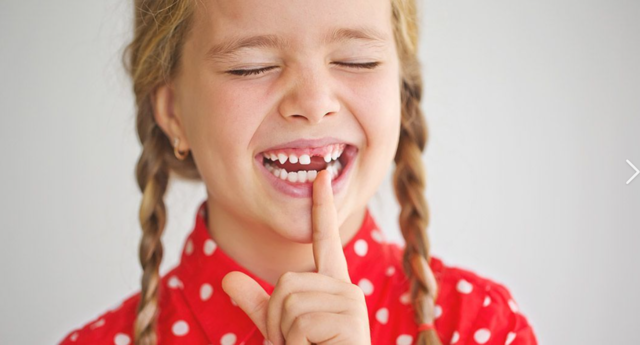 Em cau la primera dent