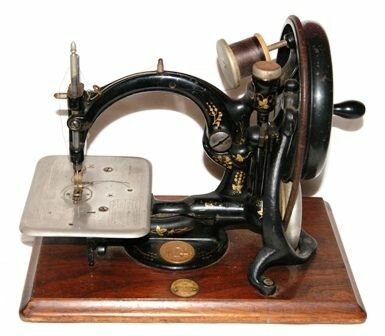 First single thread sewing machine