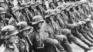 Hitler Breaking the Treaty of Versailles