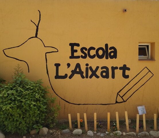 A L' ESCOLA