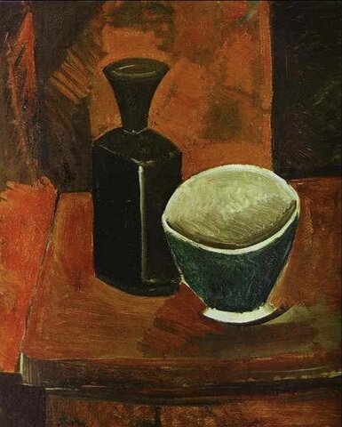 Tazza verde e bottiglia nera