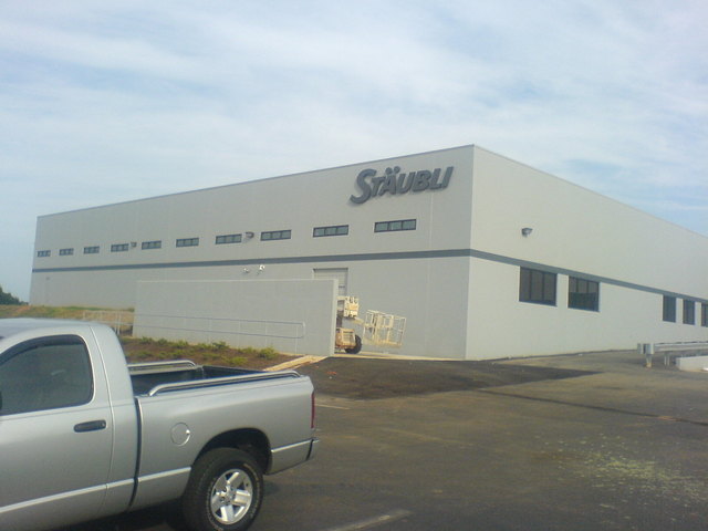 New logo sign on the opposite wall