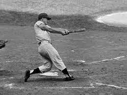 Roger Maris of the Yankees breaks Babe Ruth's single season home run record
