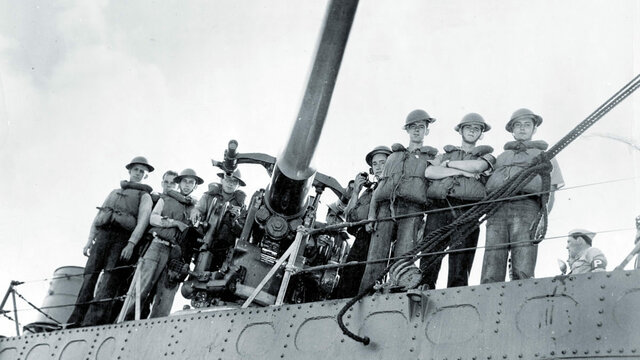 USS Ward fires on a Japanese Submarine