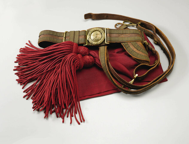 Charles Cummings receives belt, sash, and sword