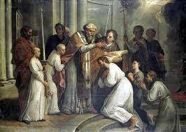 San Agustín es bautizado.