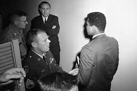 Boxer Muhammed Ali refuses military service