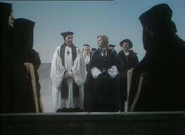 Hamlet and Horatio witness Ophelia's burial