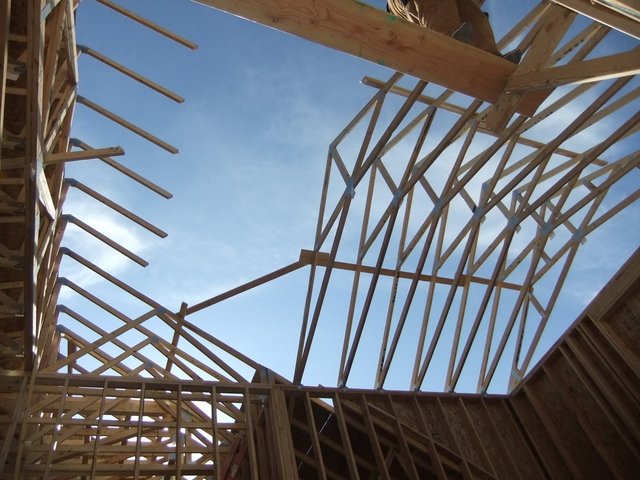 Flat rafters were removed to make way for the vaulted replacements