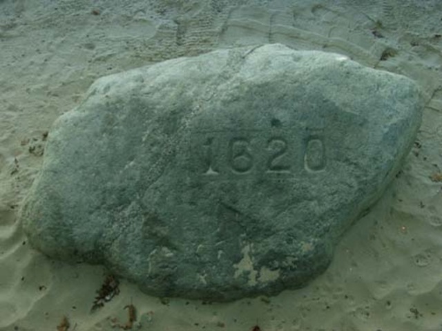 The Pilgrims land on Plymouth Rock