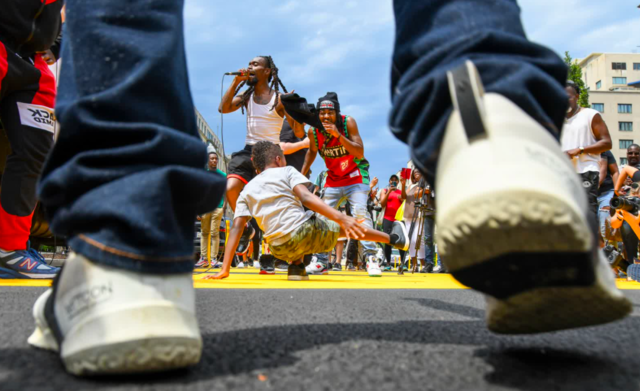 People celebrate Juneteenth at the Black Lives Matter Plaza in Washington D.C. A few days earlier, Joe Biden announced Juneteenth as a federal holiday.