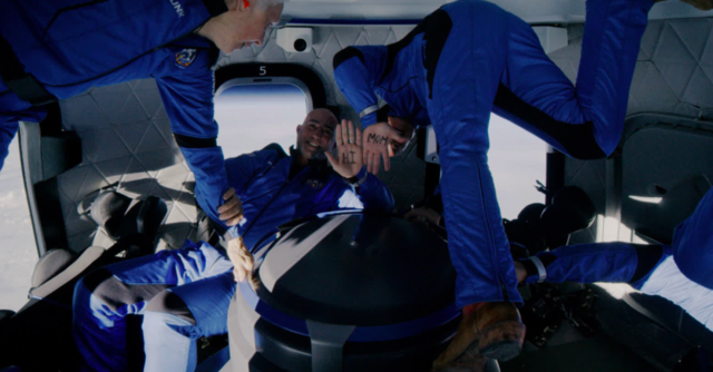 Mark and Jeff Bezos fly into space, in Jeff Bezos' space company rocket ship.