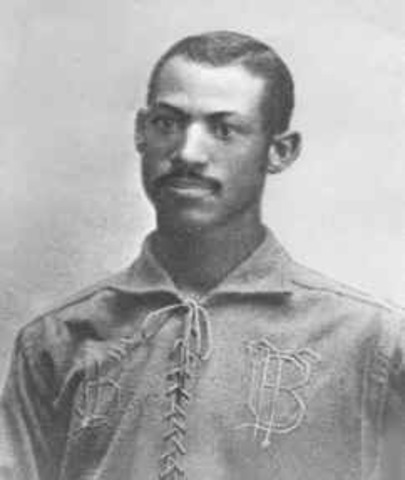 Moses "Fleetwood" Walker becomes first African-American player in Major League Baseball