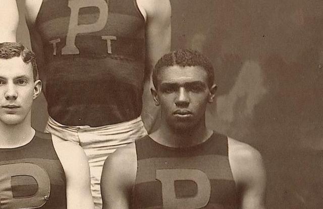 John "Doc" Taylor becomes first African American o win Olympic Gold