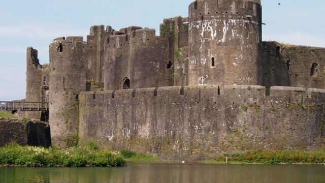 Massive walls and guard towers used to surrounded a castle and protect it