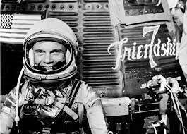 First Man to Orbit Earth From USA