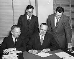 Truman signs Housing Act