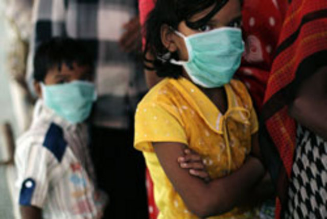 Swine flu spreads in Asia