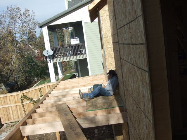 one of the construction workers trying out the deck