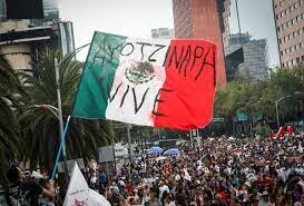 in Mexico and other parts of the world, the first day of the "Global Action for Ayotzinapa" is celebrated