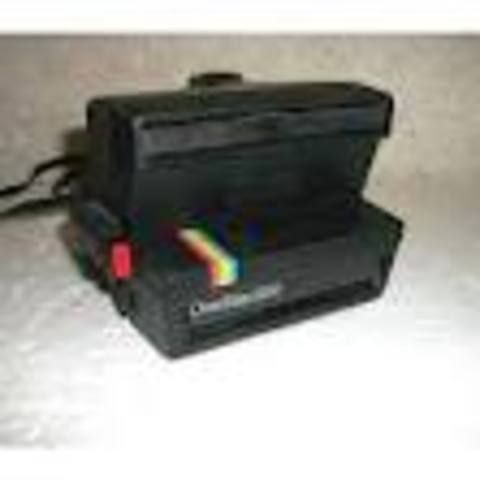 1º cámara de fotos.