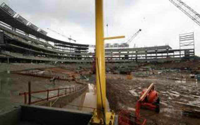 Symbolic foul pole ceremony: The Padres raise 70 foot foul pole to mark the site of construction.