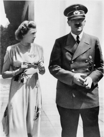 Adolf Hitler poisons his wife and kills himself