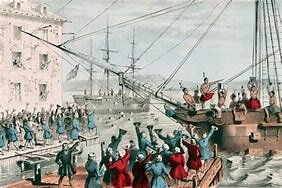 At Boston, Tea Party’ colonists toss British tea in Boston Harbor