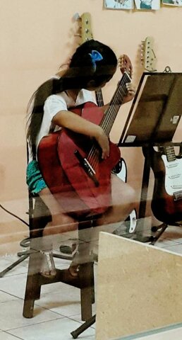 Aprendí a ejecutar la guitarra