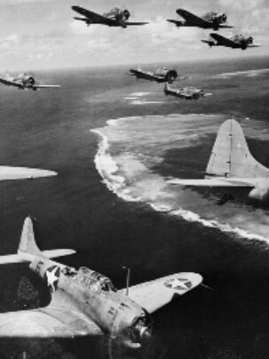 United States Navy defeats Japanese at Battle of Midway Island atoll.
