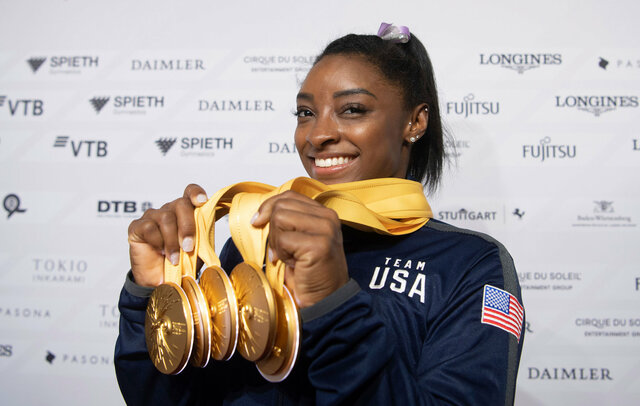 First Female U.S. gymnast to win four gold medals at a single Games