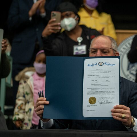 Gov. Edwards Signs the First and Historic Posthumous Pardon of Homer A. Plessy