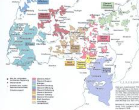 Charles V splits Hapsburgs controlled empire into two kingdoms; Spain and Austria
