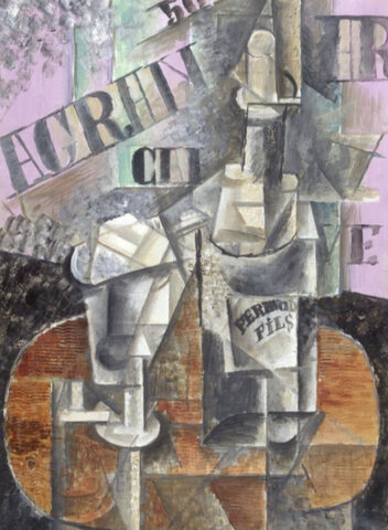 Taula en un café. Ampolla de Pernod.