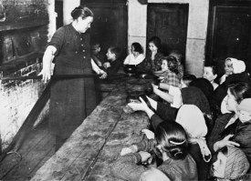 Women and Children Receiving Bread Russia during the First world War.