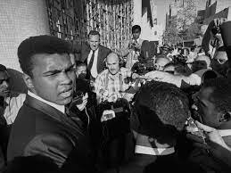Boxer Muhammad Ali refused military service